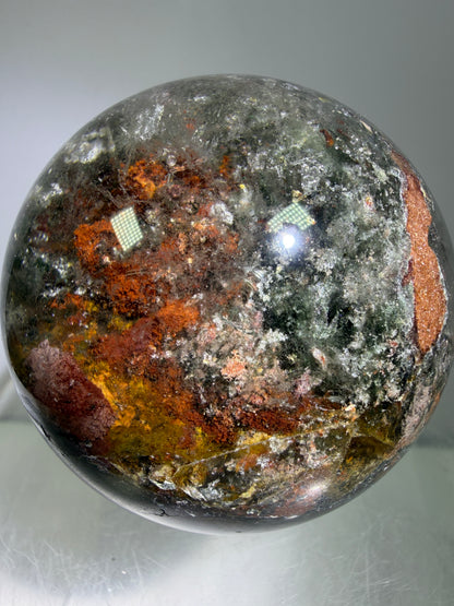 Garden Quartz Lodolite Sphere. 57mm. Orange And Red Colorful Landscape. High Quality With Rare Colors!