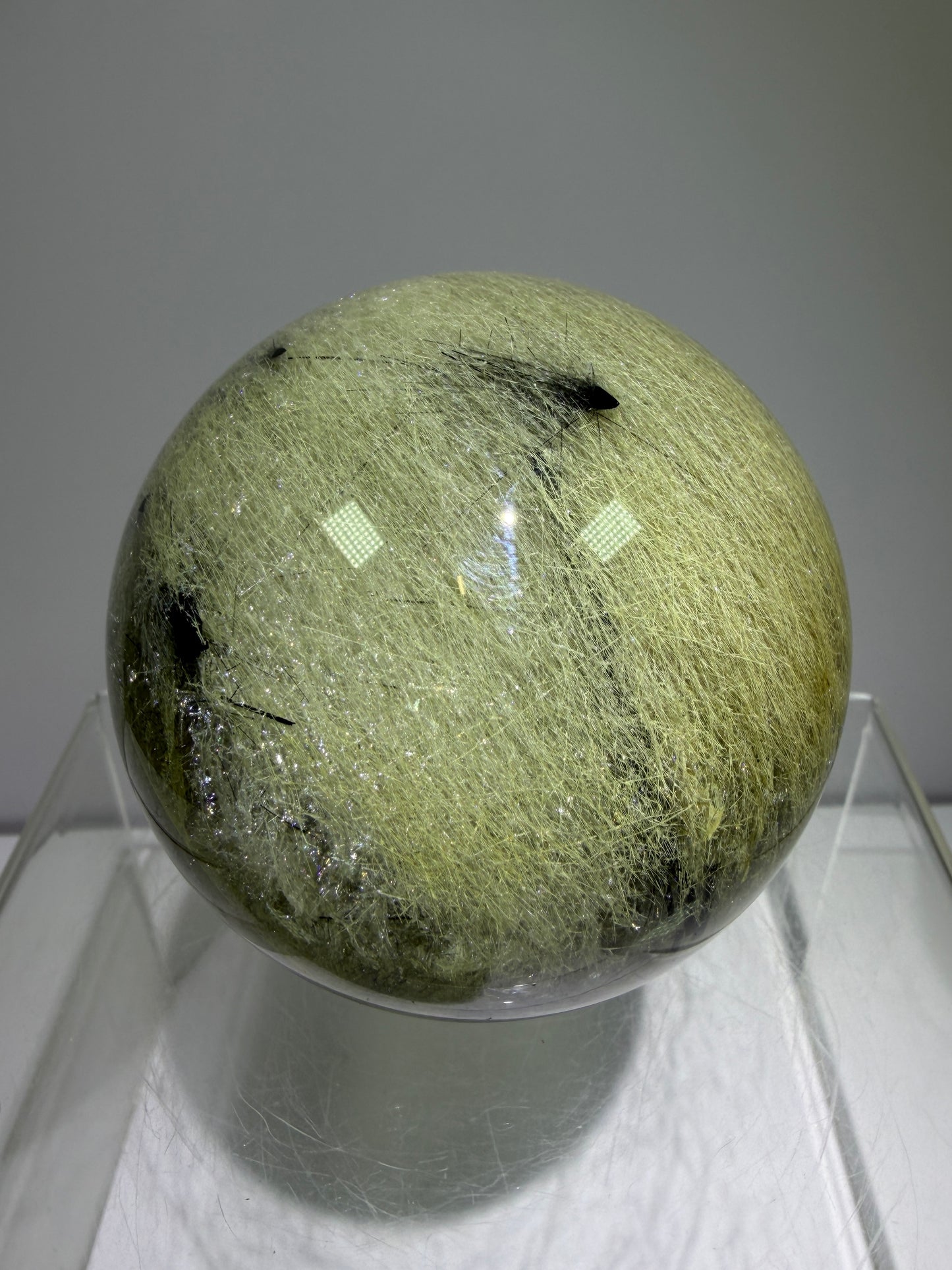Black Tourmaline And Rabbit Hair Quartz Sphere. 70mm. Stunning Rabbit Hair Rutile With Black Tourmaline Inclusions. Very Rare Display Sphere.