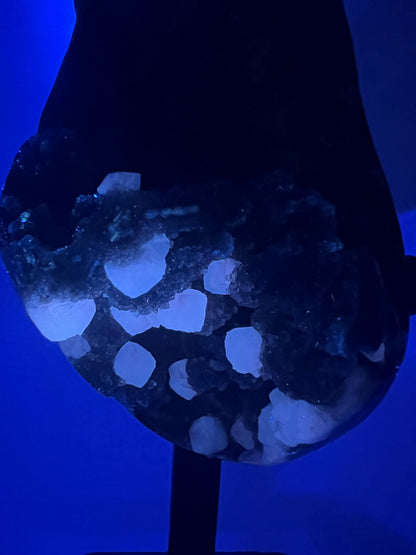 Amethyst And Calcite Geode Specimen. World Class Uruguayan Specimen. Very Rare Black, Red, And Orange Colors. Custom Made Steel Stand