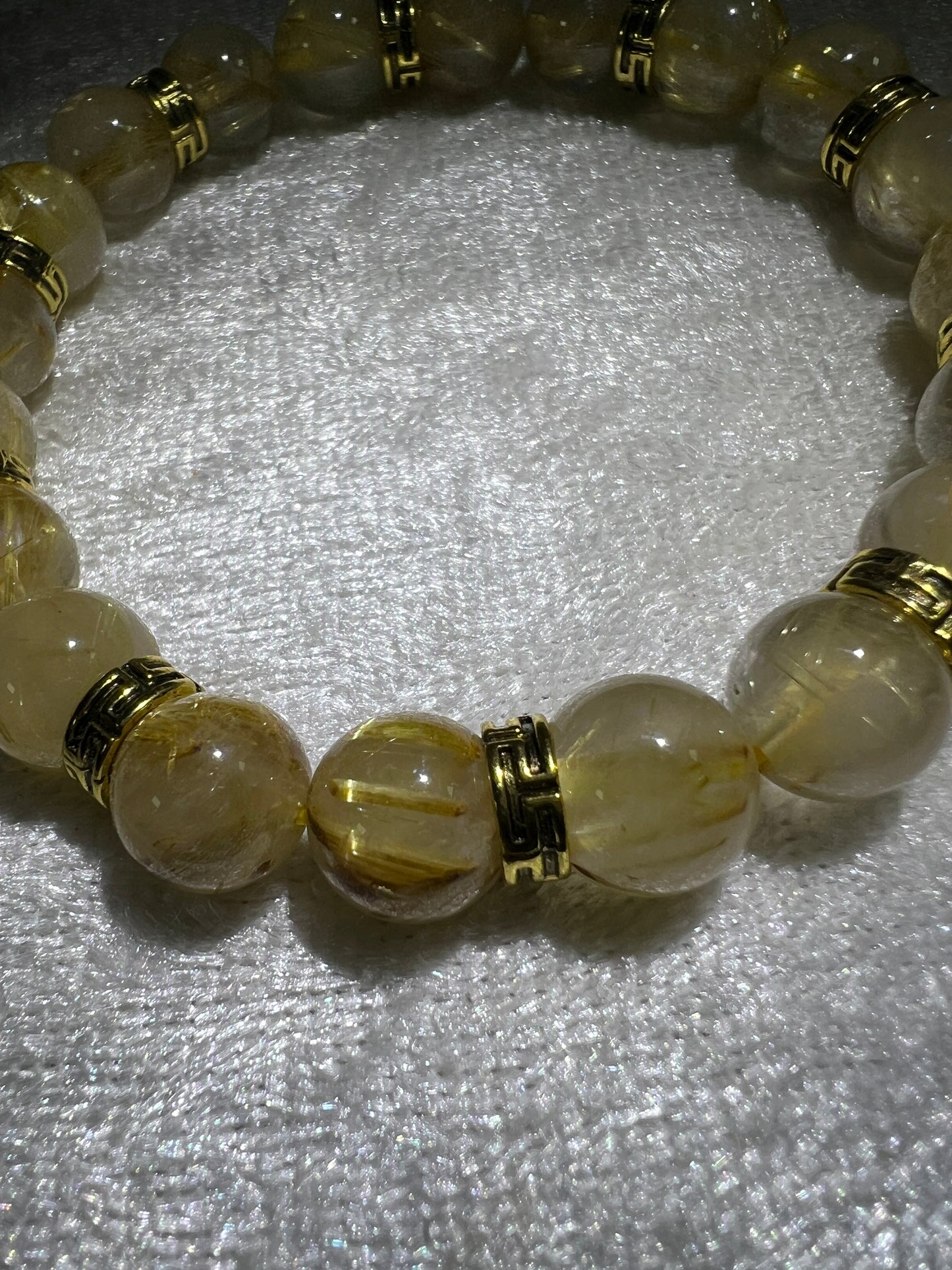 Rutile Quartz Crystal Bead Bracelet. Beautiful Rutilated Quartz Bracelet. 9.5mm. Amazing Golden Spacers.