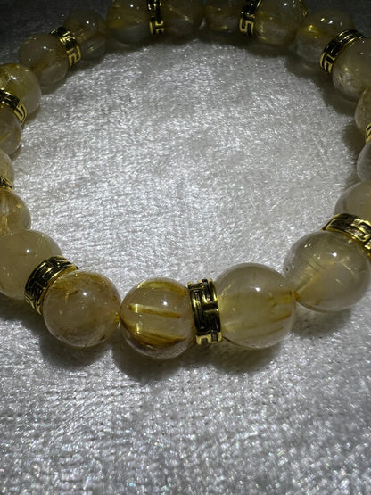Rutile Quartz Crystal Bead Bracelet. Beautiful Rutilated Quartz Bracelet. 9.5mm. Amazing Golden Spacers.
