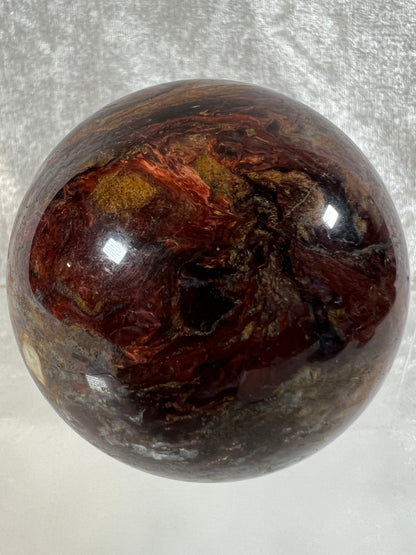 Pietersite Crystal Sphere. 66mm. Gorgeous Rare Red Pietersite Crystal. High Quality Display Sphere With Amazing Flash.