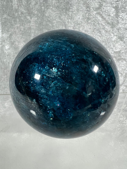 Blue Apatite Crystal Sphere. 66mm. Gorgeous Bright Blue With Lots Of Iridescent Flash. High Quality Display Sphere
