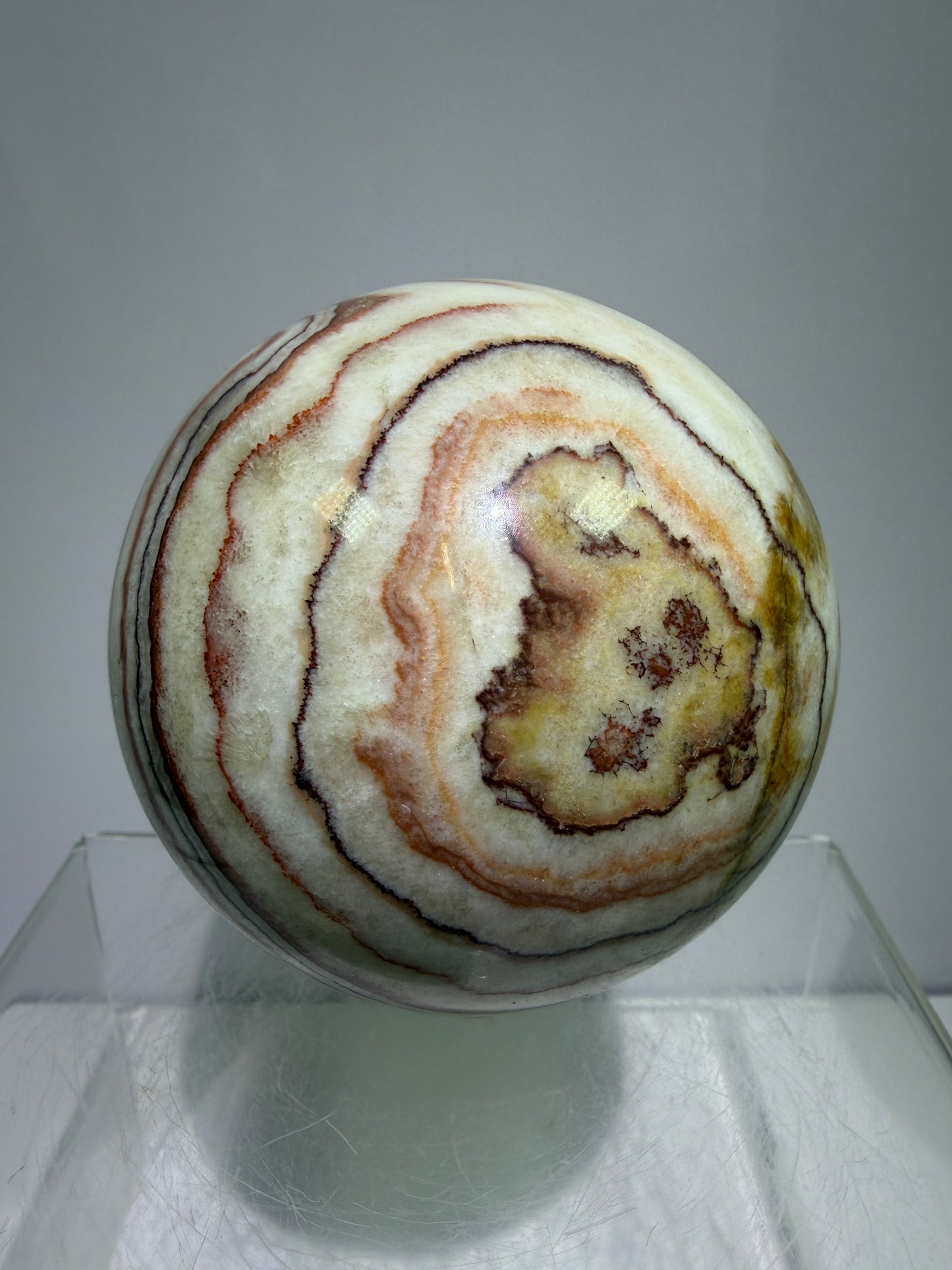 Pork Stone Crystal Sphere. 77mm. Red Banded Calcite Display Sphere. High Quality UV Reactive Crystal