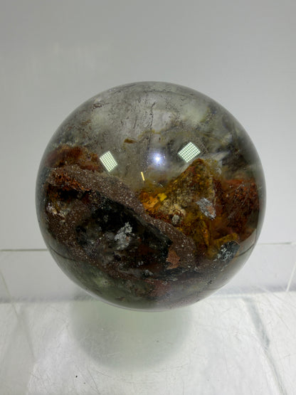 Garden Quartz Lodolite Sphere. 57mm. Orange And Red Colorful Landscape. High Quality With Rare Colors!