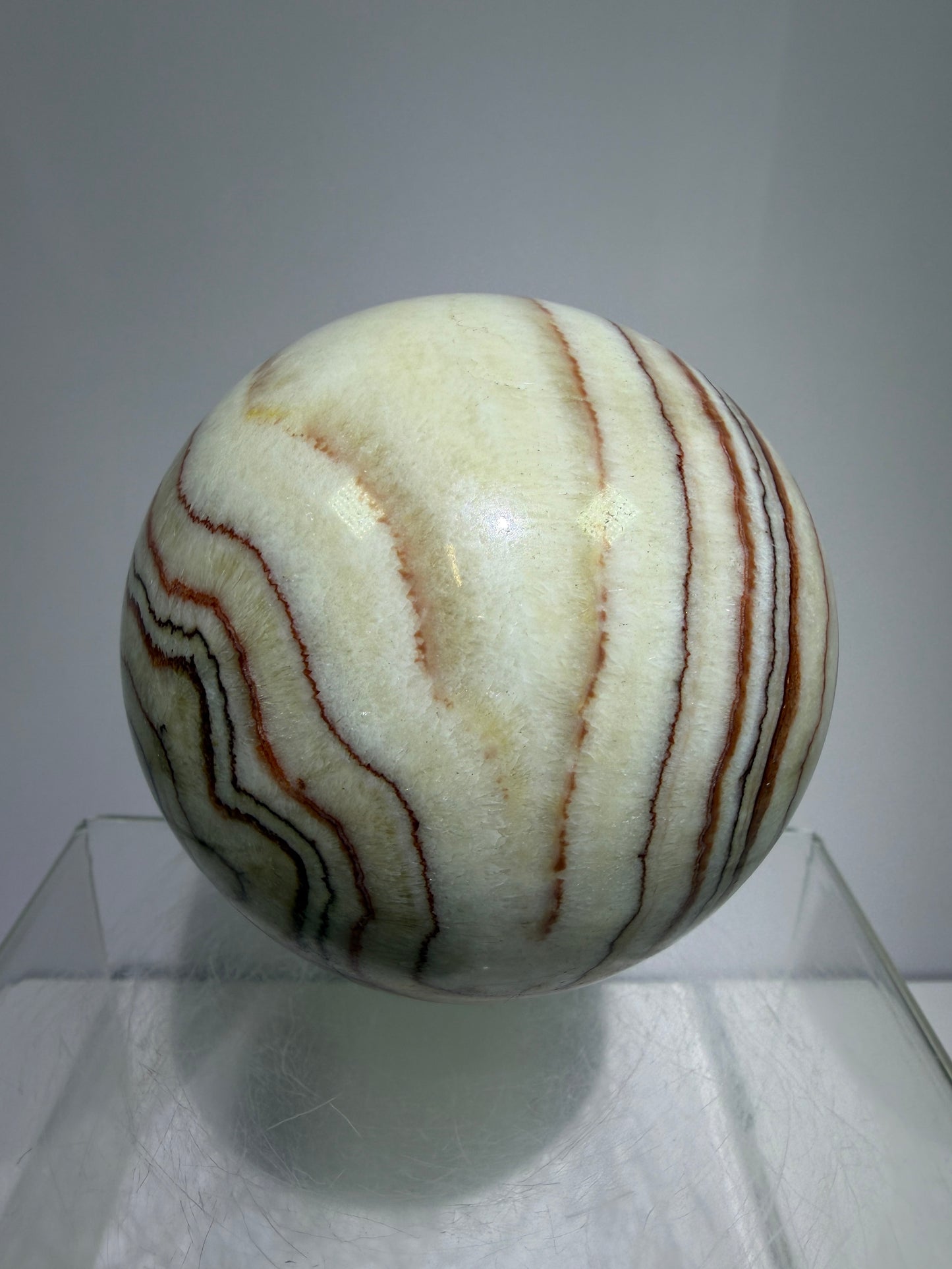 Pork Stone Crystal Sphere. 77mm. Red Banded Calcite Display Sphere. High Quality UV Reactive Crystal