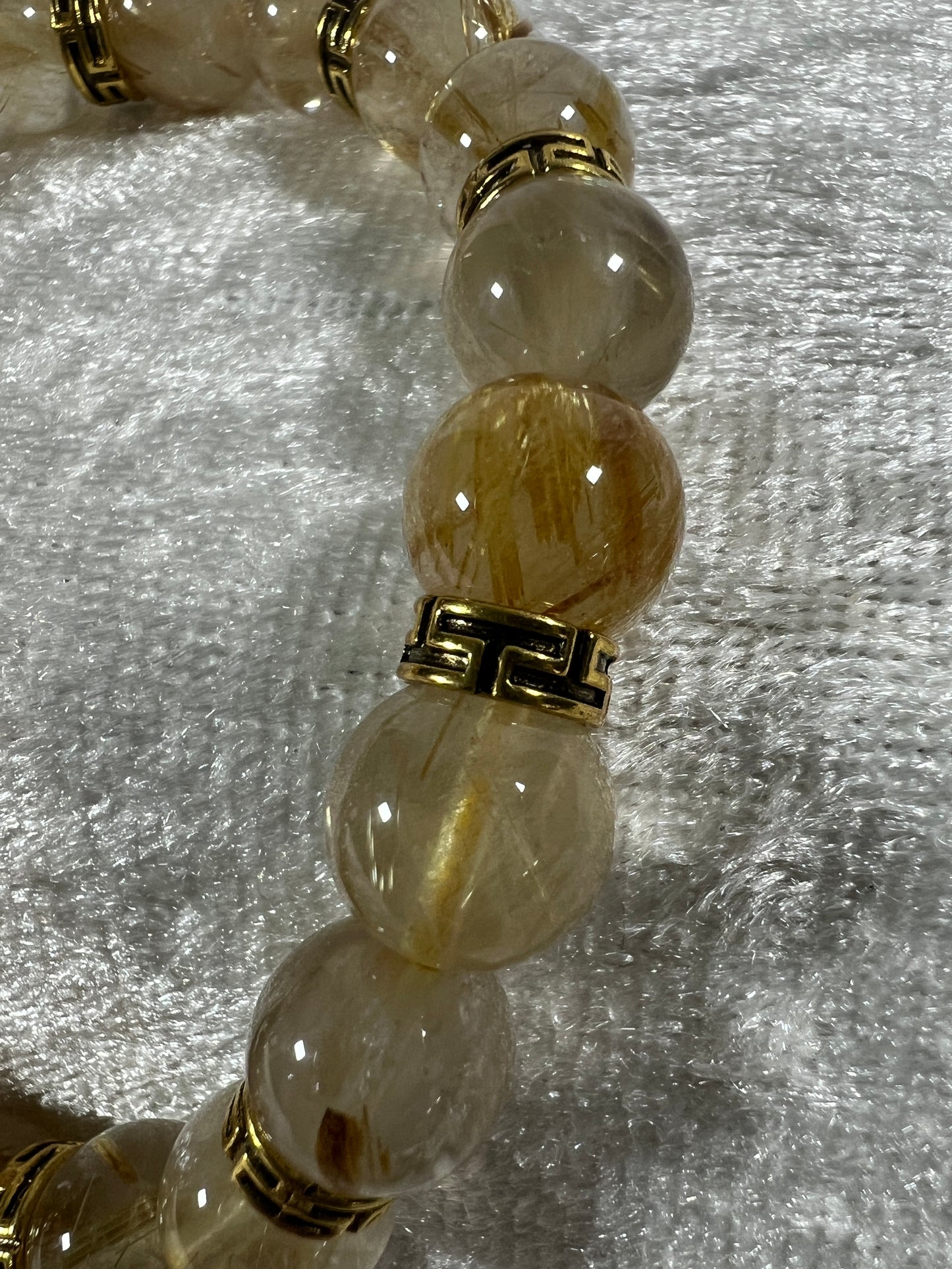 Rutile Quartz Crystal Bead Bracelet. Beautiful Rutilated Quartz Bracelet. 9.5mm. Amazing Golden Spacers.