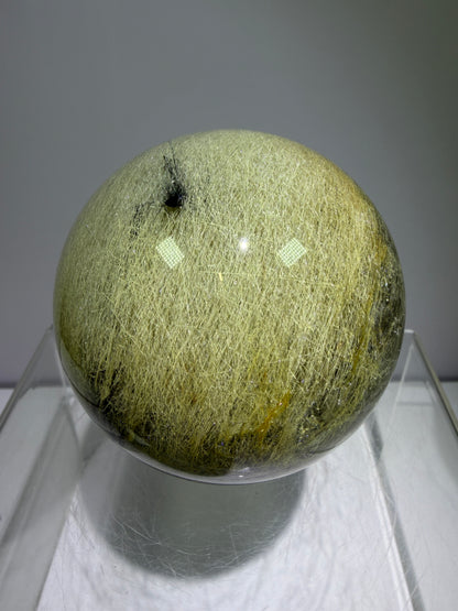 Black Tourmaline And Rabbit Hair Quartz Sphere. 70mm. Stunning Rabbit Hair Rutile With Black Tourmaline Inclusions. Very Rare Display Sphere.