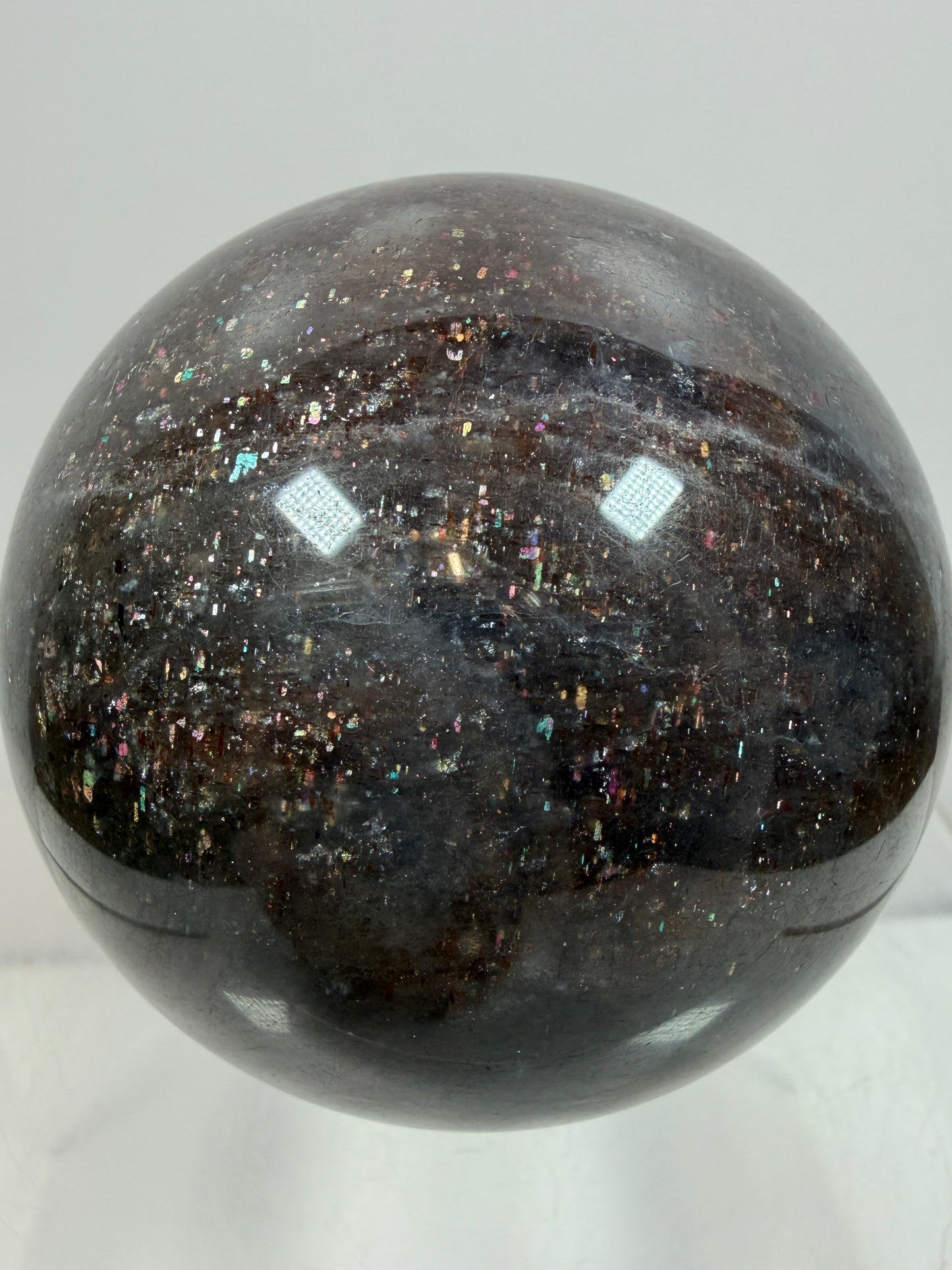 Bloodshot Iolite Sphere. 64mm. Stunning Galaxy Iolite Sunstone Display Sphere. Amazing And Colorful Flash!