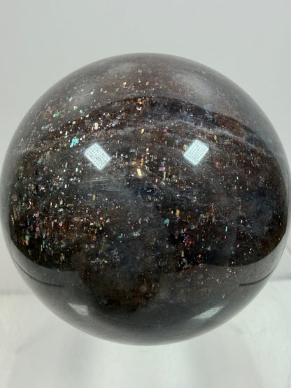 Bloodshot Iolite Sphere. 64mm. Stunning Galaxy Iolite Sunstone Display Sphere. Amazing And Colorful Flash!