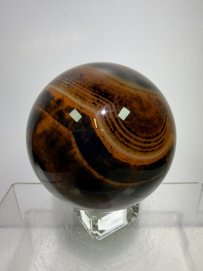 Silk Agate Sphere. 61mm. Gorgeous Banded Agate From Madagascar. Stunning Colors And Patterns On This Display Sphere.