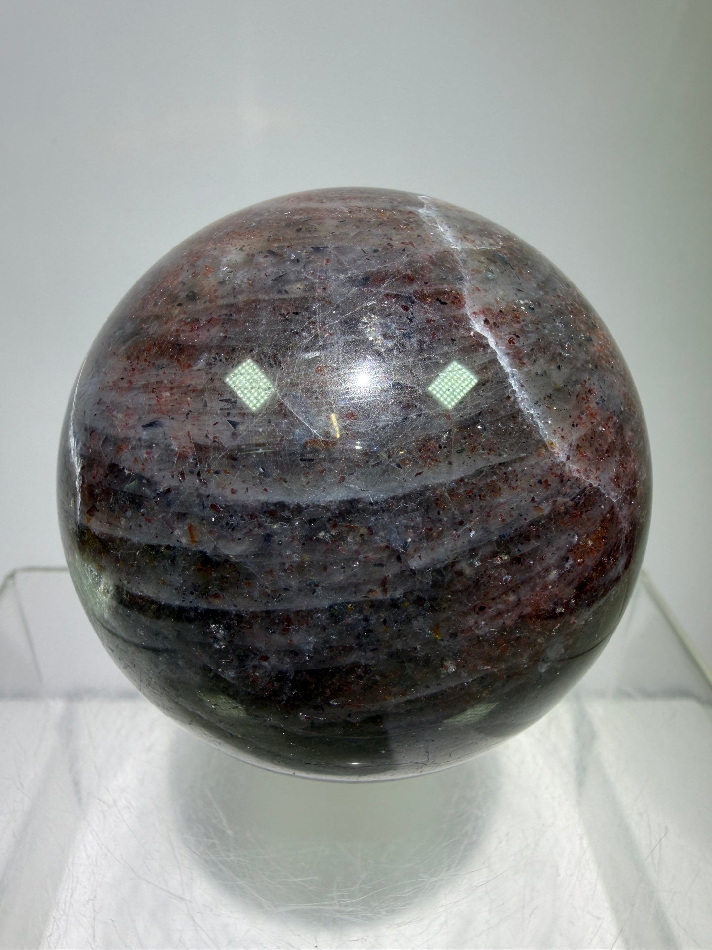 Bloodshot Iolite Sphere. 64mm. Stunning Galaxy Iolite Sunstone Display Sphere. Amazing And Colorful Flash!