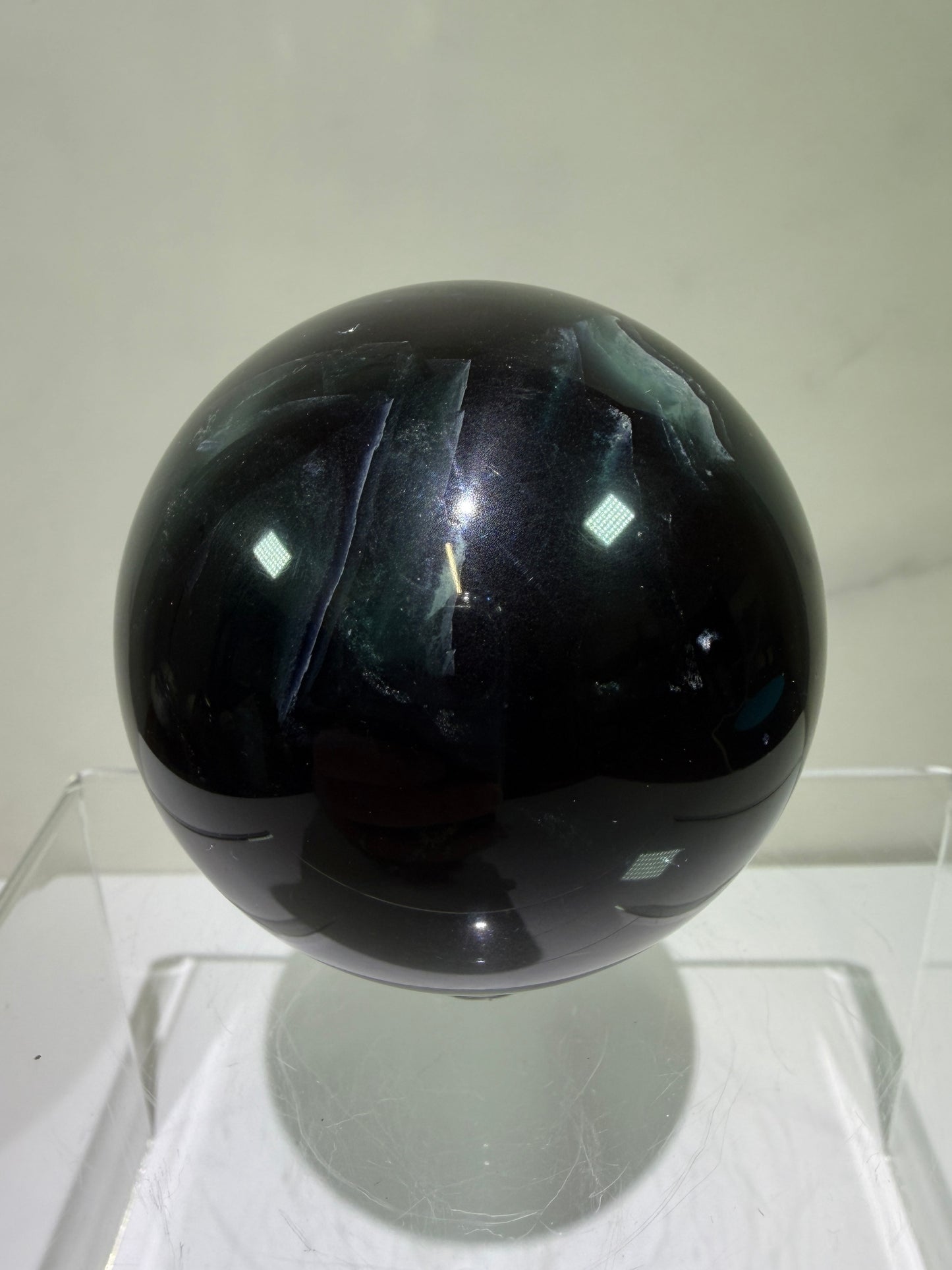 Black Rose Fluorite Sphere. 63mm. Incredible UV Reactive Crystal With Rainbows. Bright Red And Purple Reaction. Rare Display Sphere.
