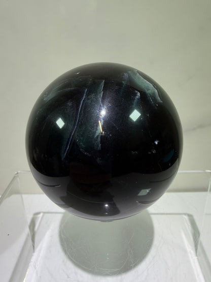 Black Rose Fluorite Sphere. 63mm. Incredible UV Reactive Crystal With Rainbows. Bright Red And Purple Reaction. Rare Display Sphere.