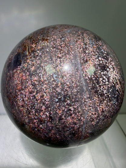 Bloodshot Iolite Sphere. 64mm. Stunning Galaxy Iolite Sunstone Display Sphere. Amazing And Colorful Flash!