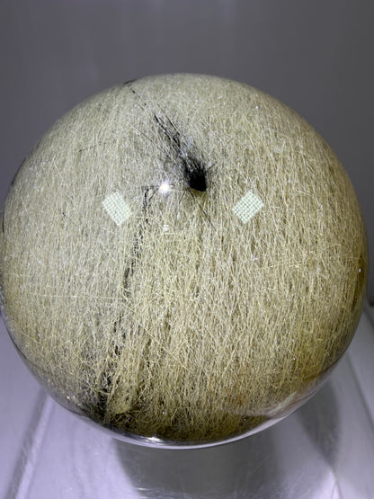 Black Tourmaline And Rabbit Hair Quartz Sphere. 70mm. Stunning Rabbit Hair Rutile With Black Tourmaline Inclusions. Very Rare Display Sphere.