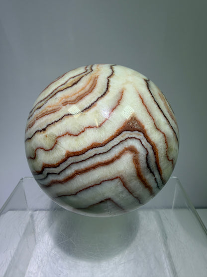 Pork Stone Crystal Sphere. 77mm. Red Banded Calcite Display Sphere. High Quality UV Reactive Crystal