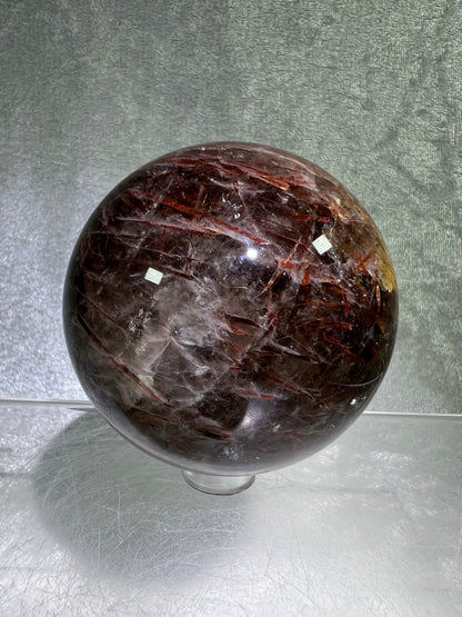 Tourmalinated Quartz Sphere. 66mm. Gorgeous Red Tourmaline Inclusions. Unique And Rare Display Sphere.