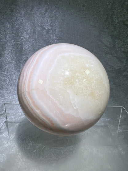 Mangano Calcite Sphere. 72mm. Very Intense Orange UV Reaction. Large High Quality Display Crystal From Peru.
