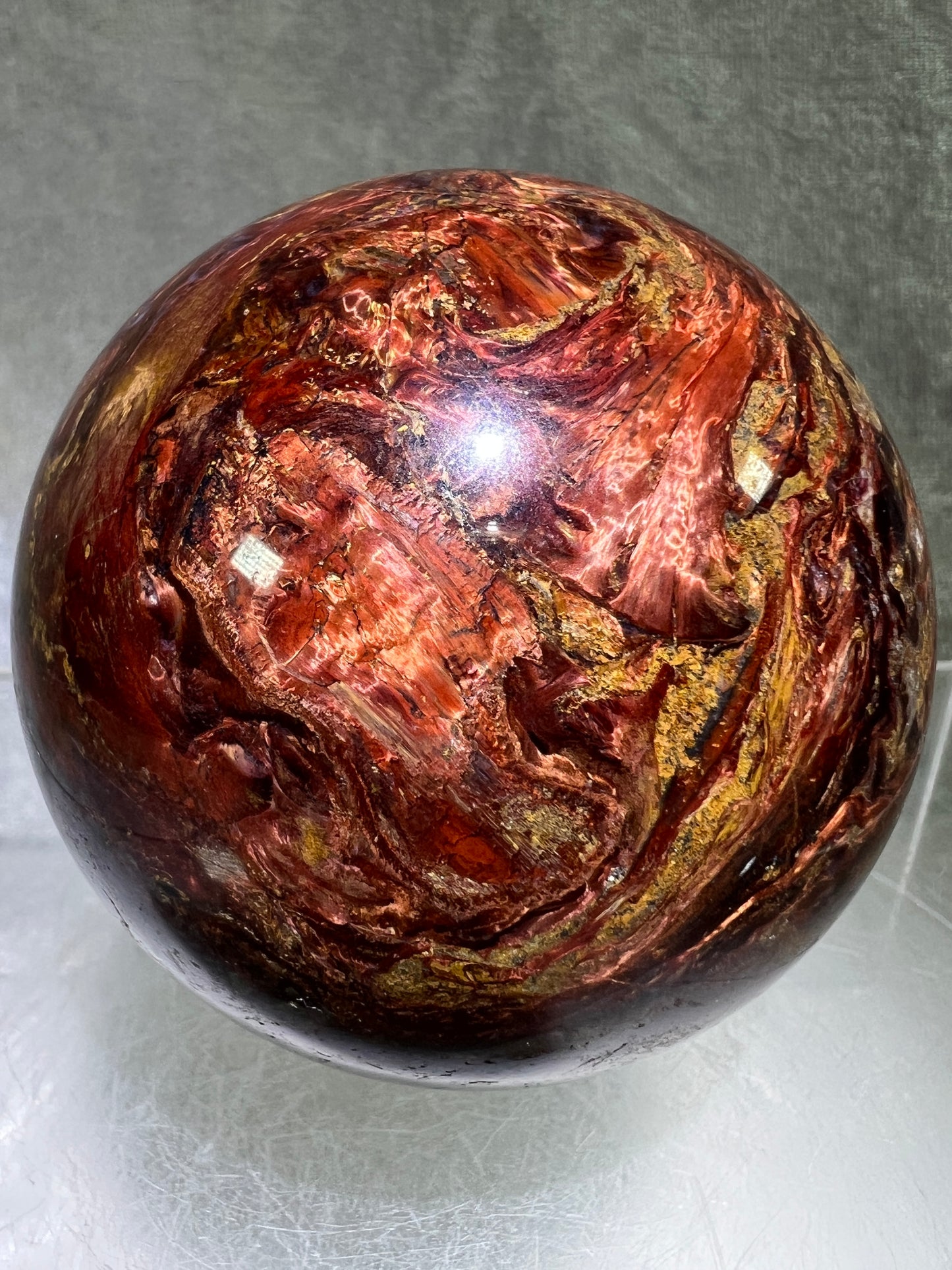 Pietersite Crystal Sphere. 66mm. Gorgeous Rare Red Pietersite Crystal. High Quality Display Sphere With Amazing Flash.