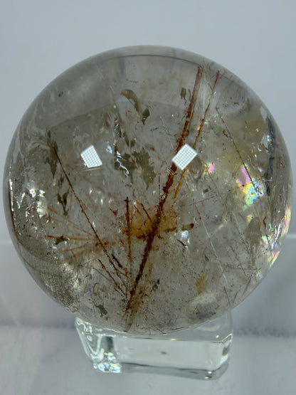 Rutile And Tourmaline Quartz Sphere. 43mm. Incredible Rainbows, With Phantoms And Spots Of Lodolite. Very Rare Display Sphere