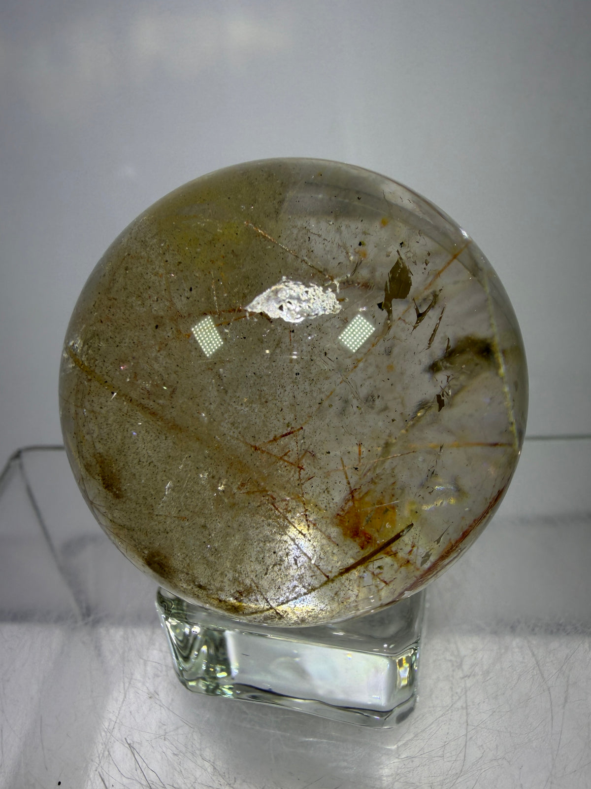 Rutile And Tourmaline Quartz Sphere. 43mm. Incredible Rainbows, With Phantoms And Spots Of Lodolite. Very Rare Display Sphere