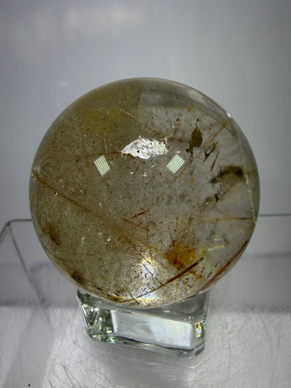 Rutile And Tourmaline Quartz Sphere. 43mm. Incredible Rainbows, With Phantoms And Spots Of Lodolite. Very Rare Display Sphere