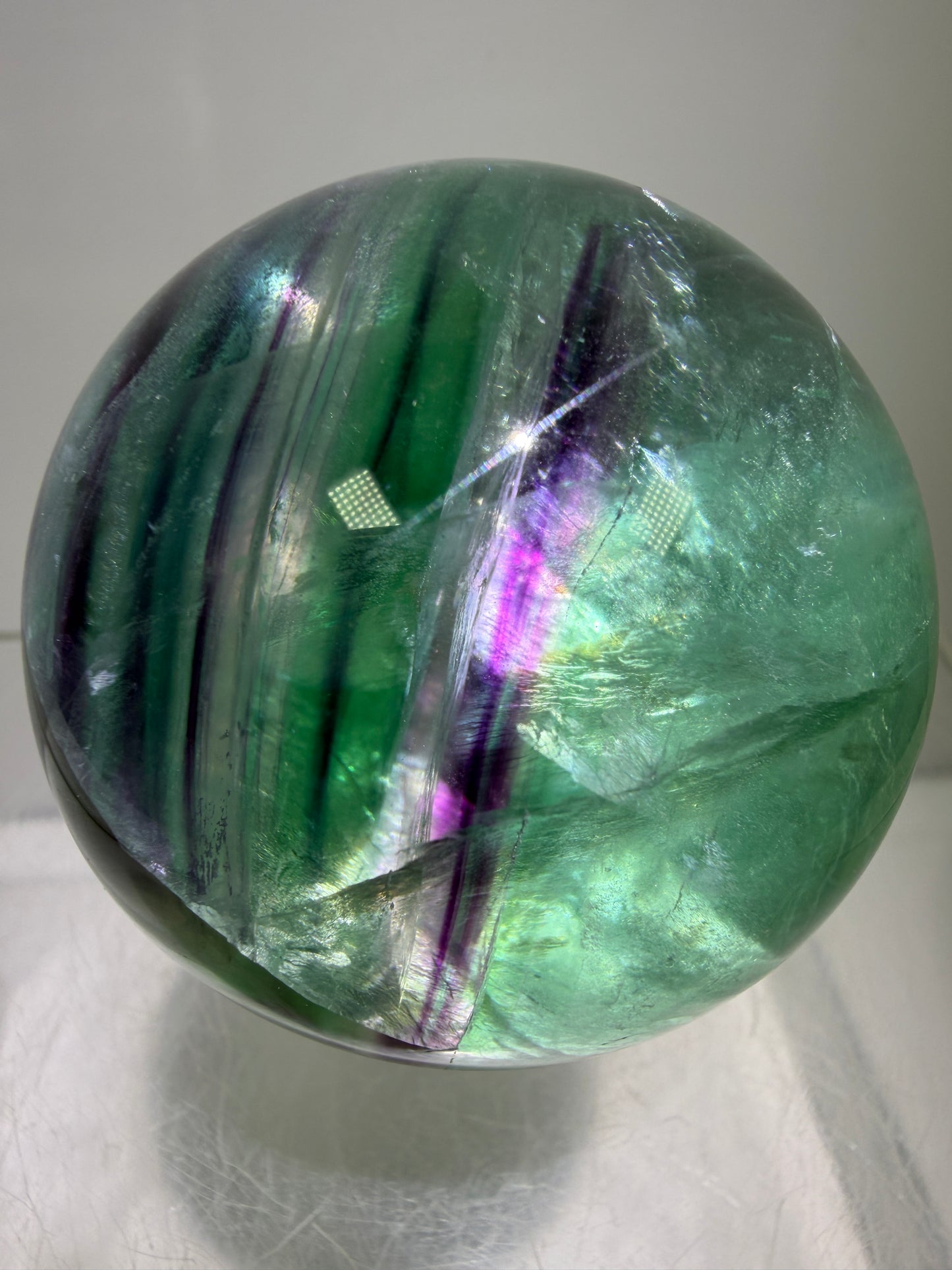 Green And Purple Fluorite Sphere. High Quality Display Sphere With Stunning Rainbows.