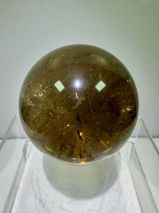 Rutile Quartz Sphere. 70mm. Large Smoky Quartz With Rare Golden Rutile Inclusions. Nice Quality Display