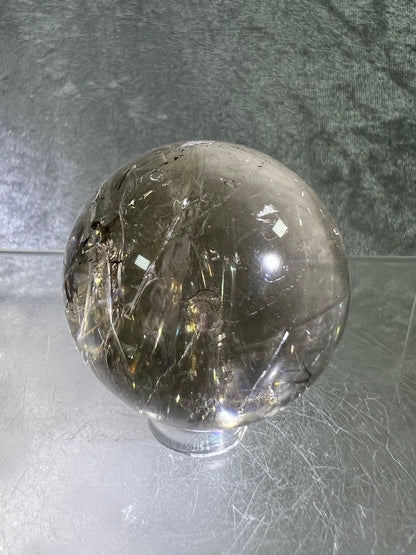 Rutile Quartz Sphere. Amazing Rainbows! Light Smoky Quartz With Stunning Golden Rutile Inclusions.