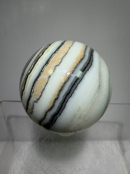 Banded Zebra Calcite Sphere. 53mm. Gorgeous Calcite Display Sphere. Rare Colors With Stunning Patterns