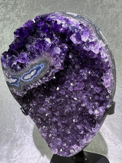Amethyst Geode Specimen. World Class Uruguayan Specimen. Stunning Top Quality Statement Piece! Custom Made Steel Stand