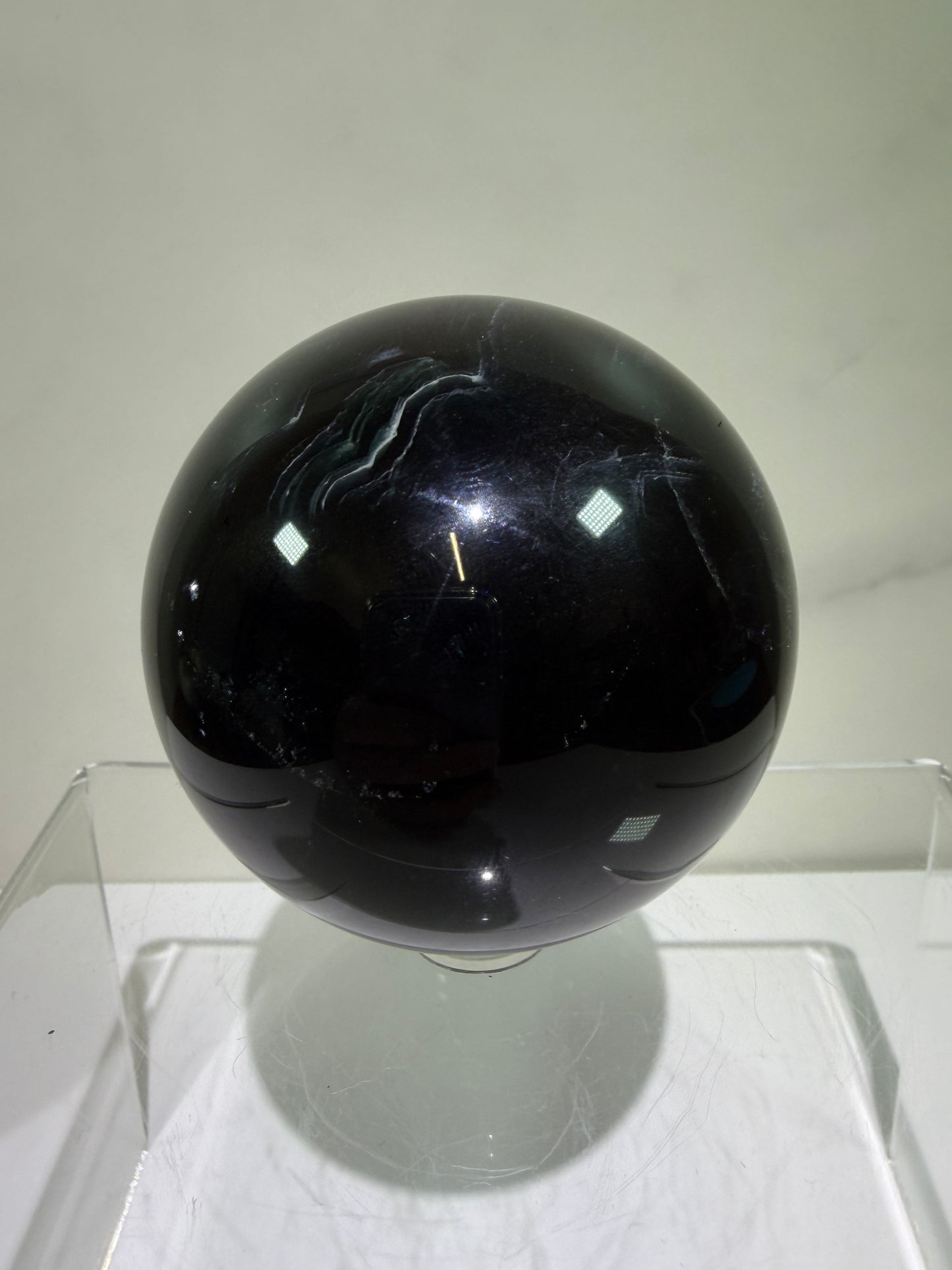 Black Rose Fluorite Sphere. 63mm. Incredible UV Reactive Crystal With Rainbows. Bright Red And Purple Reaction. Rare Display Sphere.