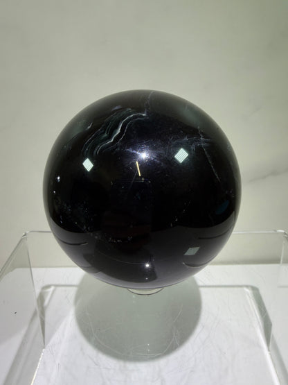 Black Rose Fluorite Sphere. 63mm. Incredible UV Reactive Crystal With Rainbows. Bright Red And Purple Reaction. Rare Display Sphere.