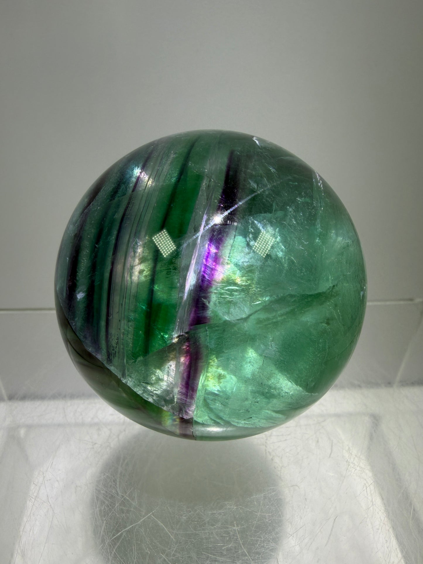 Green And Purple Fluorite Sphere. High Quality Display Sphere With Stunning Rainbows.