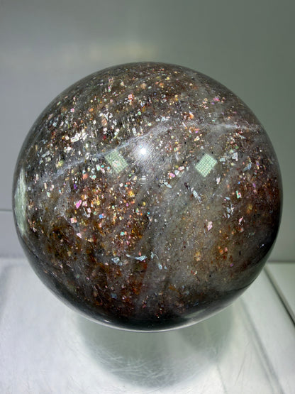 Bloodshot Iolite Sphere. 64mm. Stunning Galaxy Iolite Sunstone Display Sphere. Amazing And Colorful Flash!