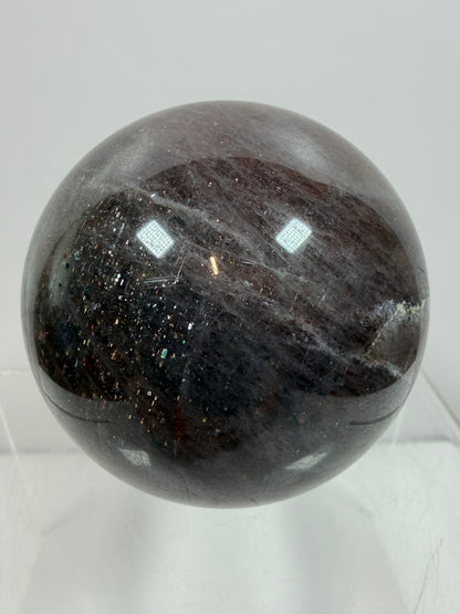 Bloodshot Iolite Sphere. 64mm. Stunning Galaxy Iolite Sunstone Display Sphere. Amazing And Colorful Flash!