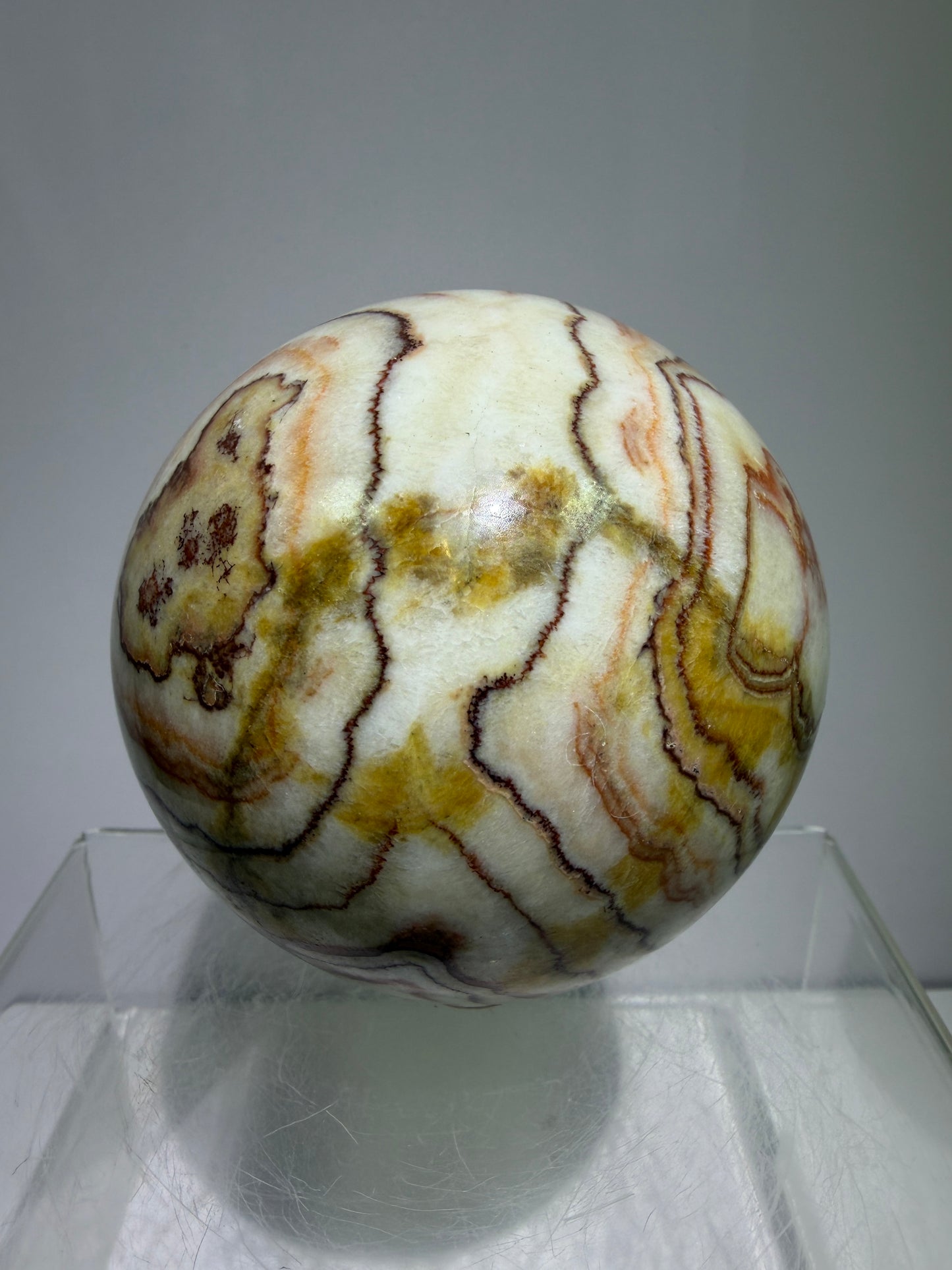 Pork Stone Crystal Sphere. 77mm. Red Banded Calcite Display Sphere. High Quality UV Reactive Crystal