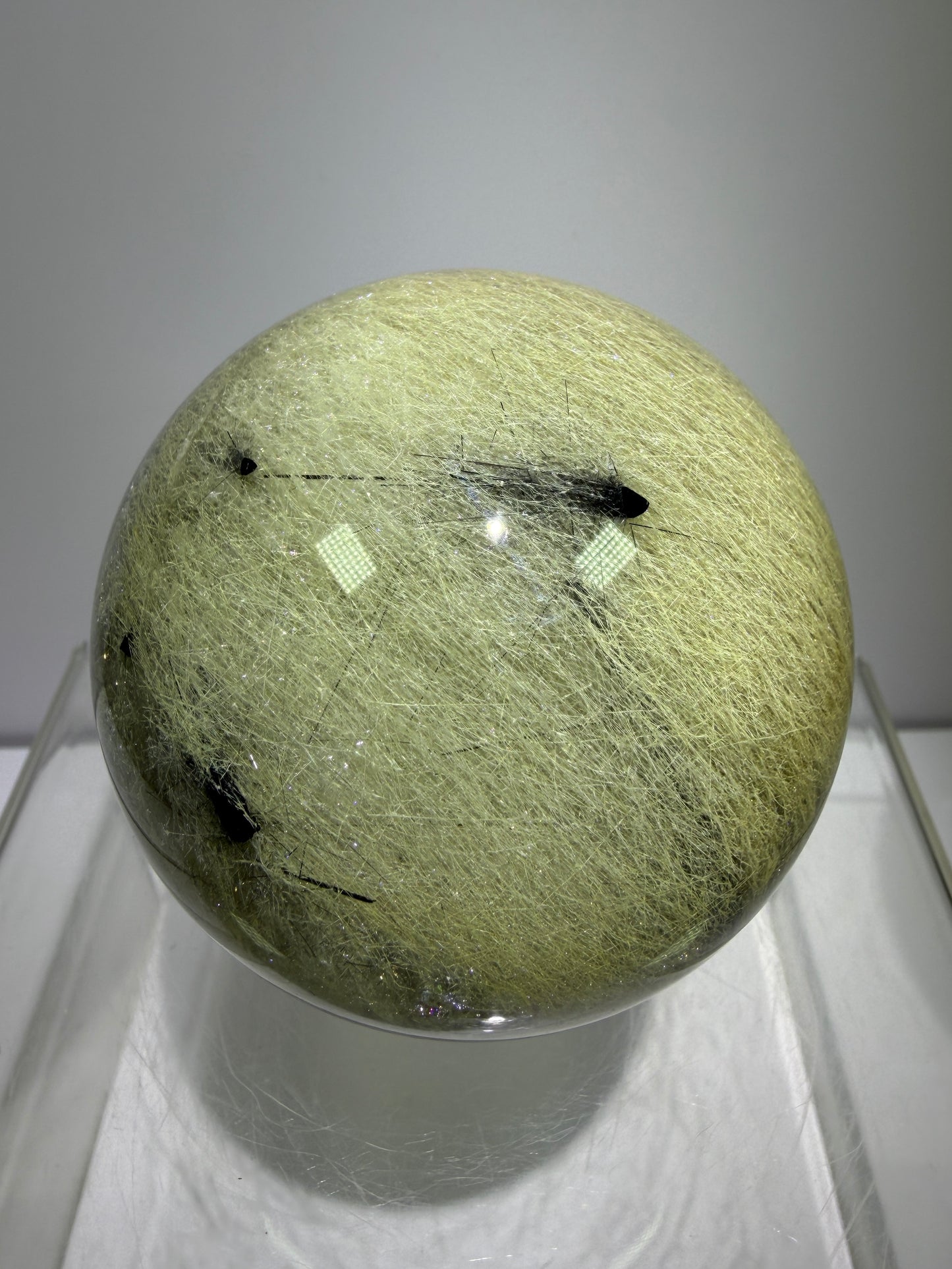 Black Tourmaline And Rabbit Hair Quartz Sphere. 70mm. Stunning Rabbit Hair Rutile With Black Tourmaline Inclusions. Very Rare Display Sphere.