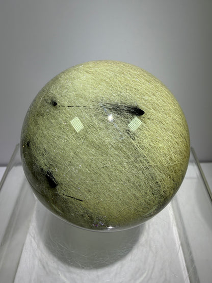 Black Tourmaline And Rabbit Hair Quartz Sphere. 70mm. Stunning Rabbit Hair Rutile With Black Tourmaline Inclusions. Very Rare Display Sphere.