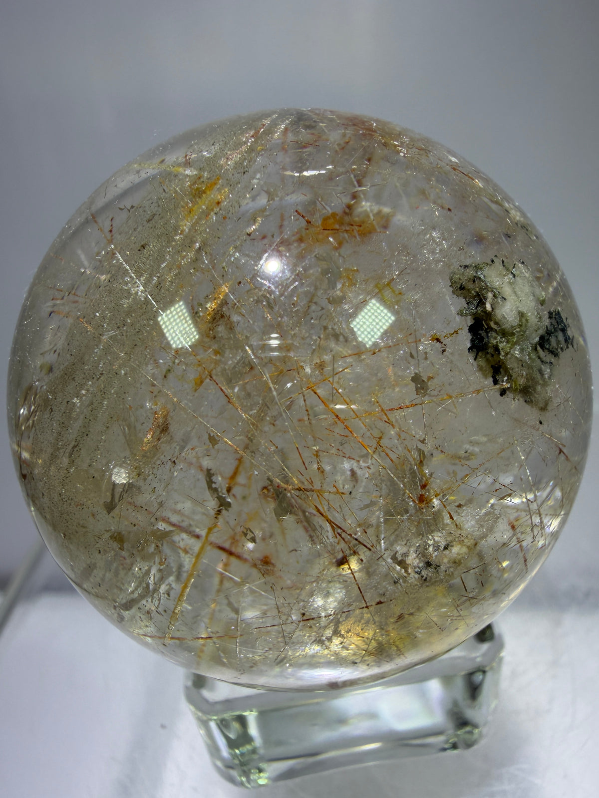 Rutile And Tourmaline Quartz Sphere. 43mm. Incredible Rainbows, With Phantoms And Spots Of Lodolite. Very Rare Display Sphere
