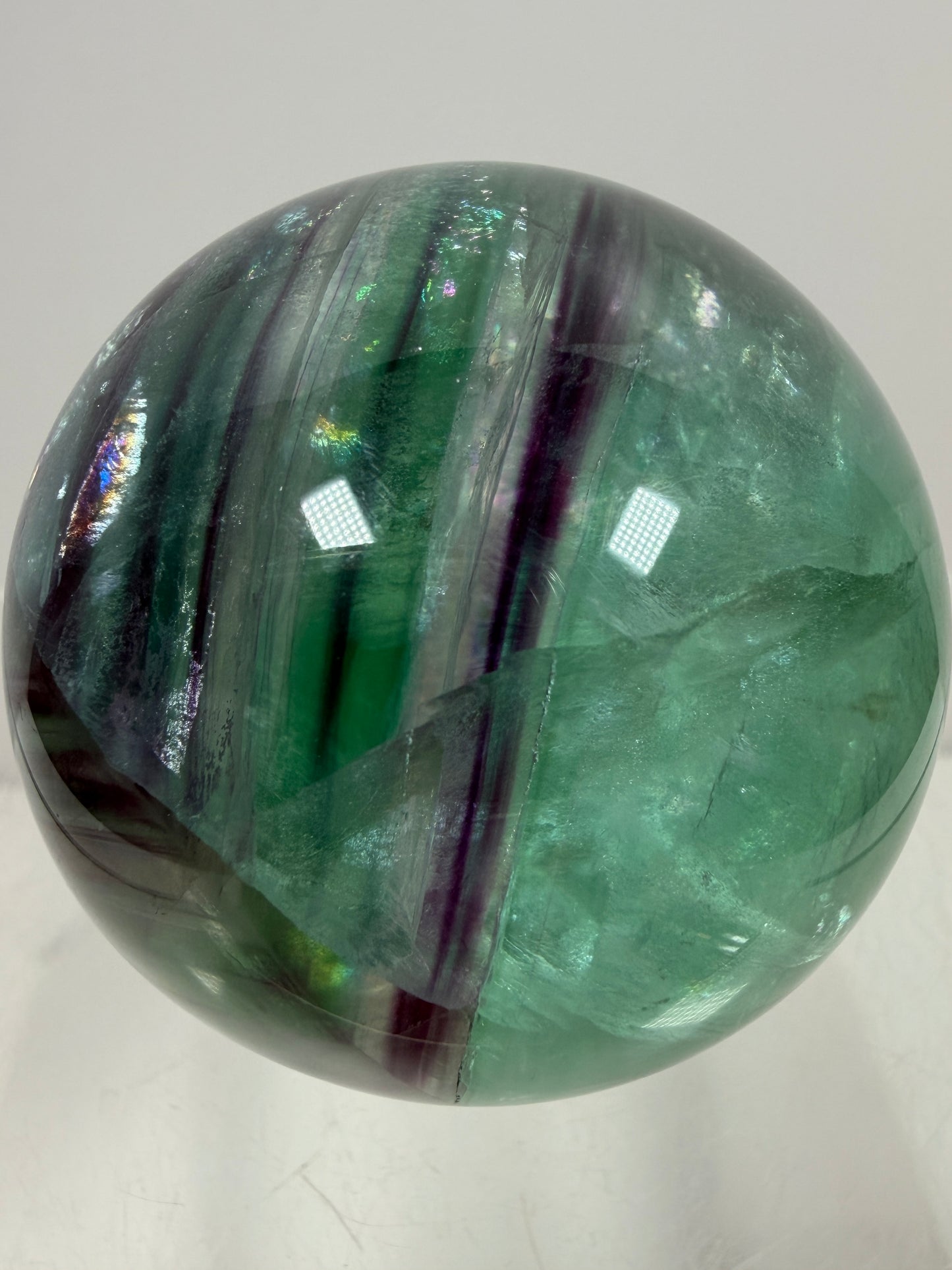 Green And Purple Fluorite Sphere. High Quality Display Sphere With Stunning Rainbows.