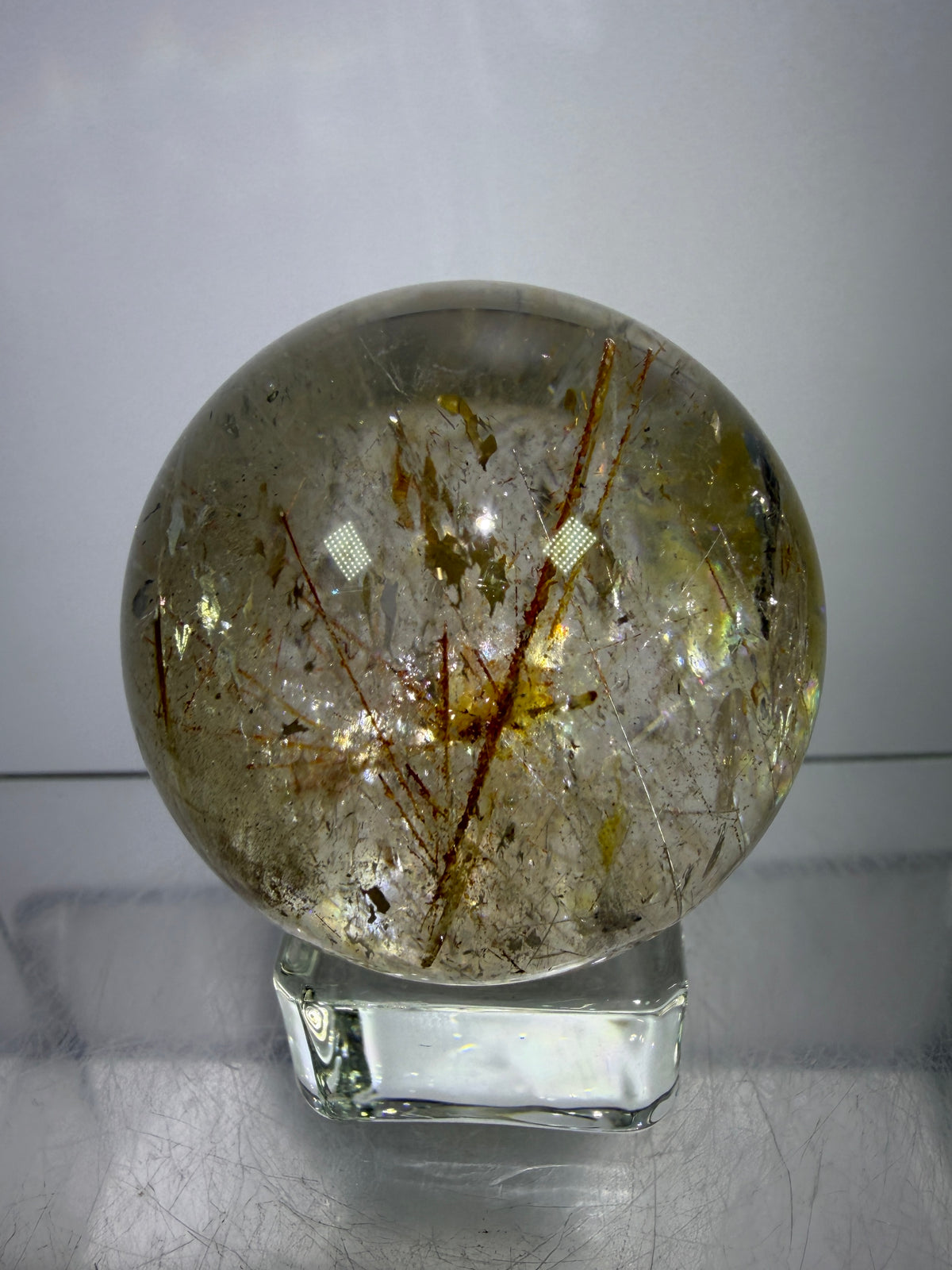 Rutile And Tourmaline Quartz Sphere. 43mm. Incredible Rainbows, With Phantoms And Spots Of Lodolite. Very Rare Display Sphere
