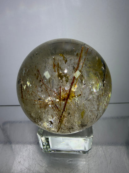Rutile And Tourmaline Quartz Sphere. 43mm. Incredible Rainbows, With Phantoms And Spots Of Lodolite. Very Rare Display Sphere
