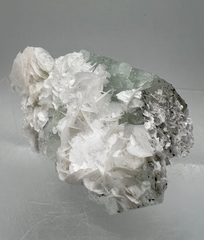 Beautiful White Rose Calcite On Fluorite Matrix. Intense Colors UV Reaction. Angel Wing Bladed Calcite Cluster.