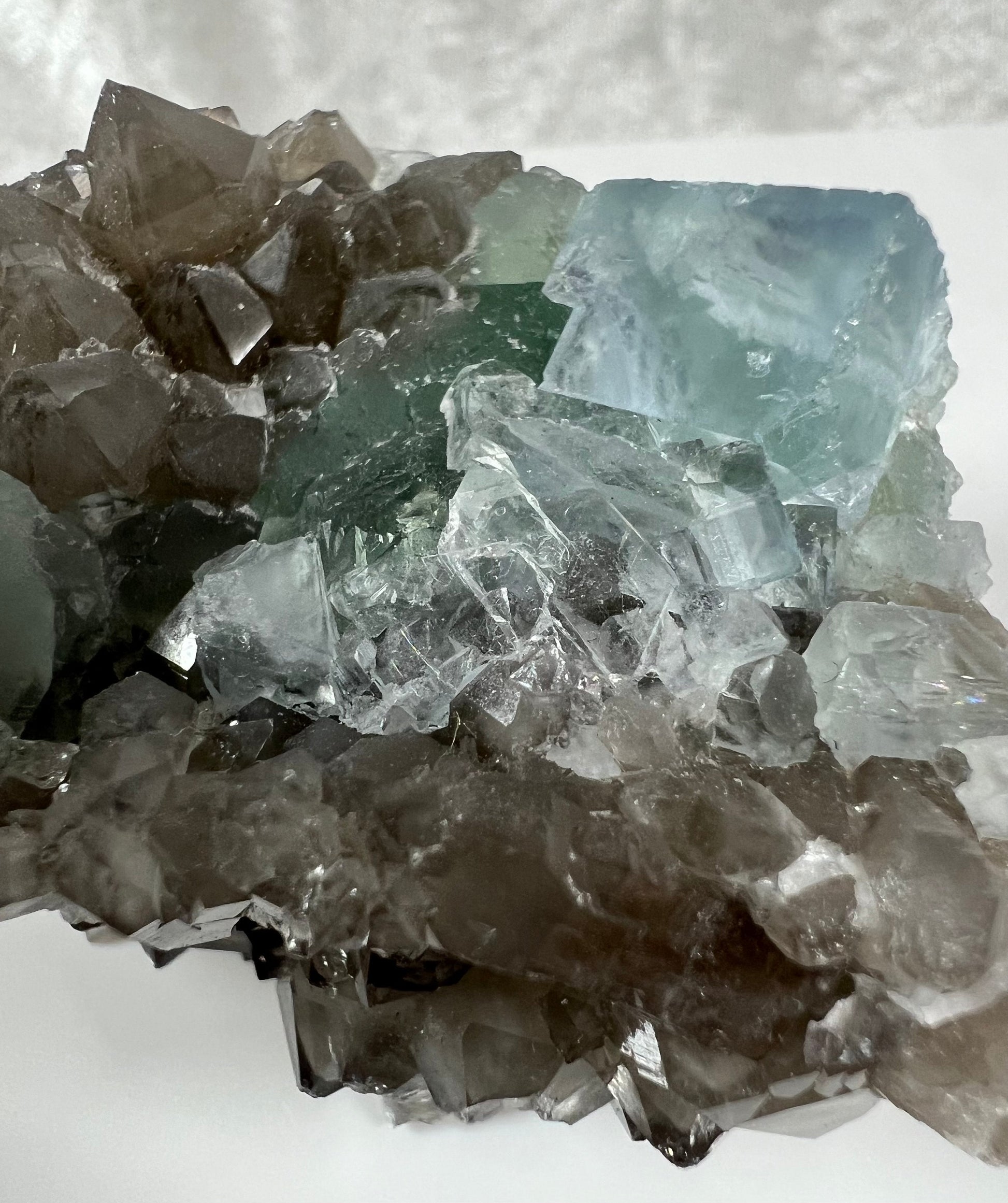 Gorgeous Xianghualing Ice Blue Fluorite And Smoky Quartz Cluster. Incredible Clear Blue Fluorite Cubes On Smoky Quartz Matrix.