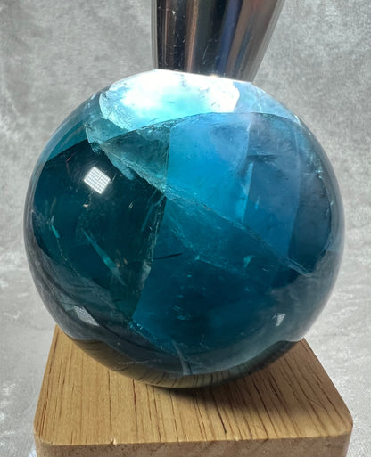 Gorgeous Blue Fluorite Sphere. 65mm. Beautiful Rainbows! White Light Display Stand Is Included. Very Nice Quality Sphere.