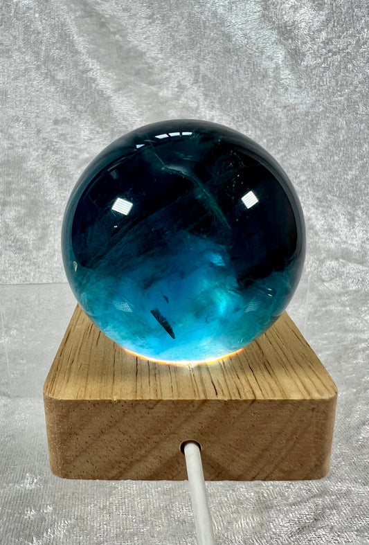 Amazing Blue Fluorite Sphere. 57mm. Huge Rainbows! White Light Display Stand Is Included. Very Nice Quality Sphere.