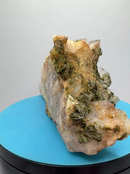 Epidote And Quartz Specimen. Stunning Quartz Cluster With Peach Inclusions Covered In Epidote.