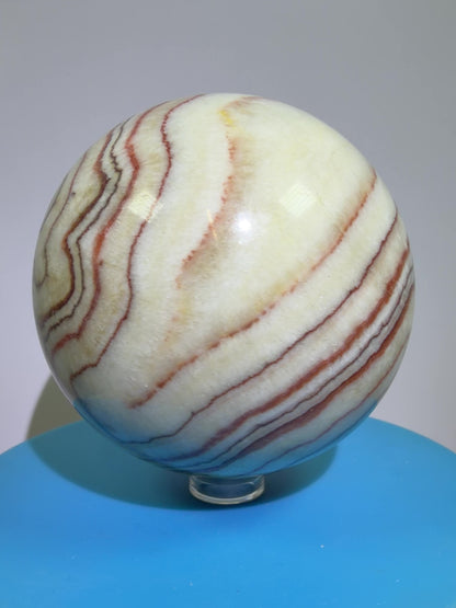 Pork Stone Crystal Sphere. 77mm. Red Banded Calcite Display Sphere. High Quality UV Reactive Crystal